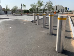 PAS 68 static Terra Venus HVM bollards installed at Yasmina School, provided by a trusted HVM bollard supplier, static bollards UAE.