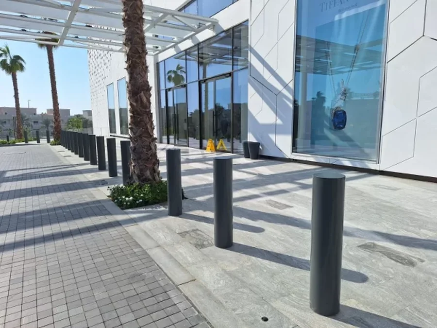 PAS 68 static Terra Venus HVM bollards installed at Marina Mall, provided by a trusted HVM bollard supplier, static bollards UAE.
