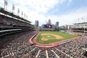 Crowded sports stadium during a baseball game highlighting the need for effective crowd control and stadium security measures.