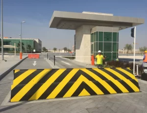 PAS 68 shallow road blocker installed at Qatar National Convention Center, provided by a trusted road blocker manufacturer.