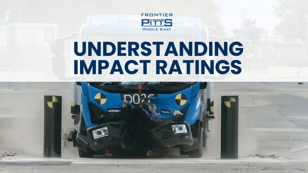 High-security bollards stopping a vehicle during crash test, illustrating impact ratings and hostile vehicle mitigation performance in the Middle East.