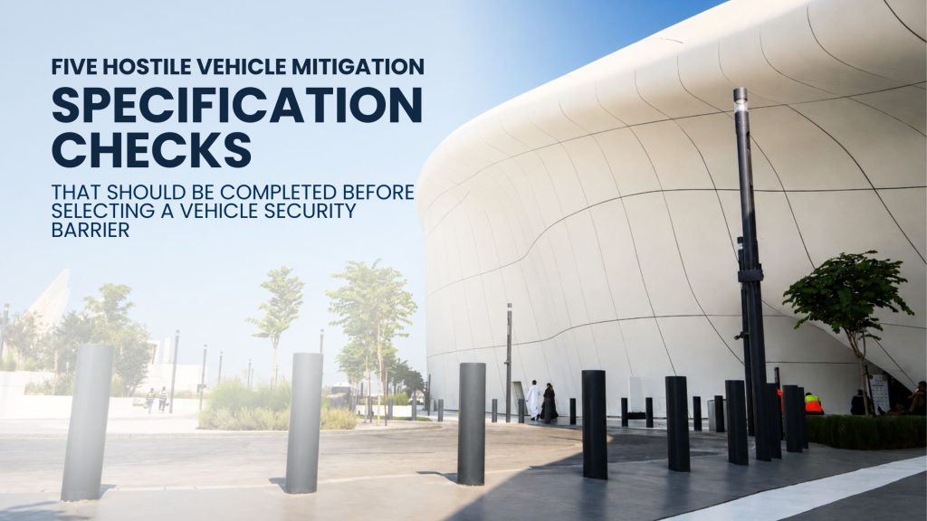 Five hostile vehicle mitigation specification checks for selecting a crash-rated vehicle security barrier, shown with security bollards protecting a modern public building.
